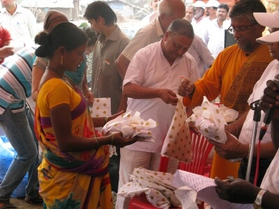 Distribution of sarees to the womenfolk