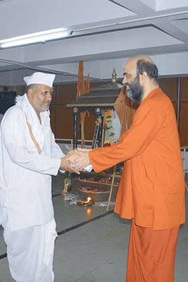 Felicitating the Chief of the dindi